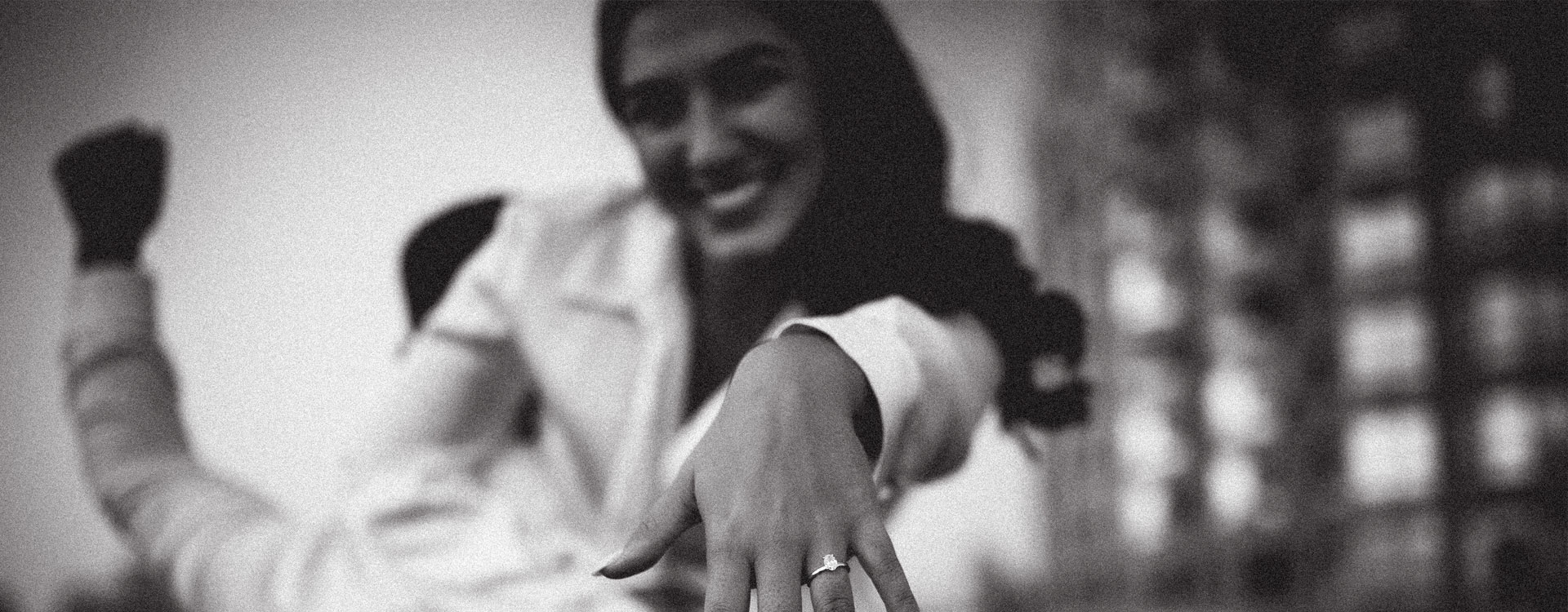 Woman showing engagement ring