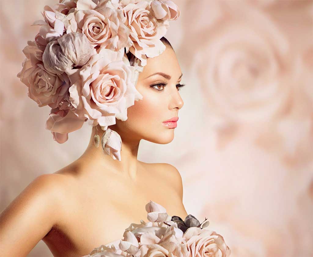 Bride with pink rose hat and dress